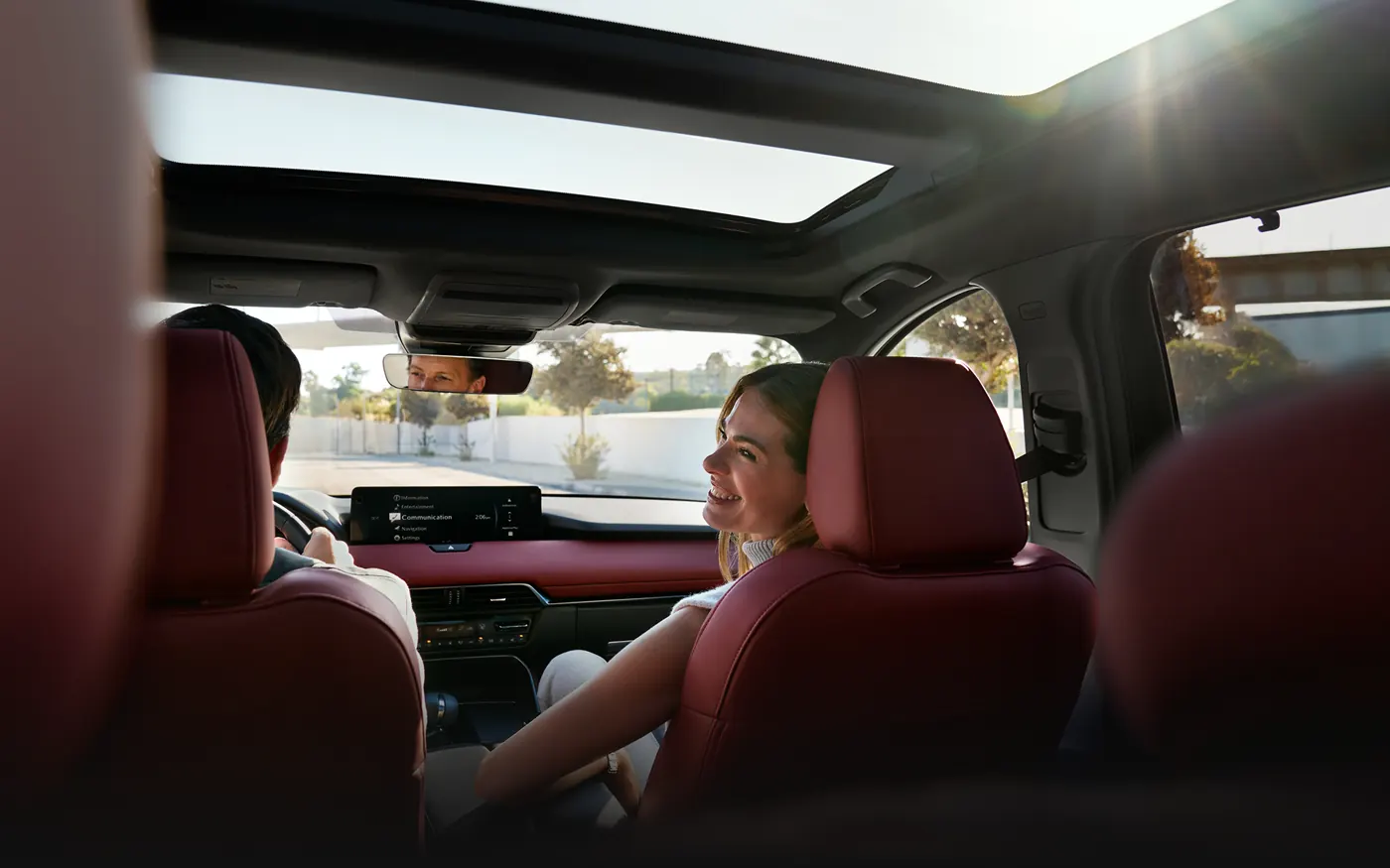 Friends riding in the 2-row 2027 Mazda CX-90 | Bob Johnson Mazda in Rochester NY